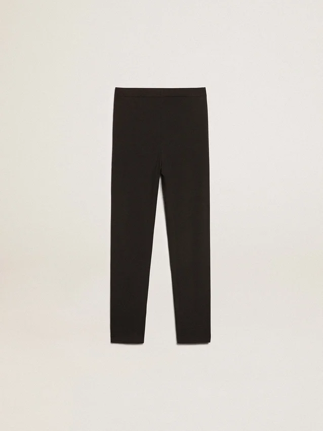 Leggings negros para niñas con estrellas blancas en los costados