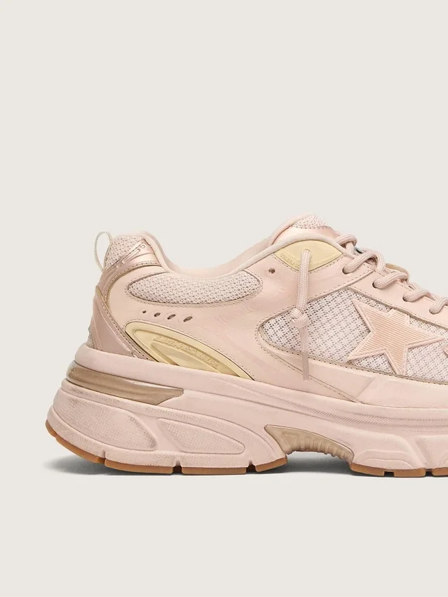 Lightstar para mujer con parte superior de cuero rosa y malla, y estrella rosa
