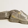 Lightstar para mujer en cuero metalizado y malla plateada con estrella gris