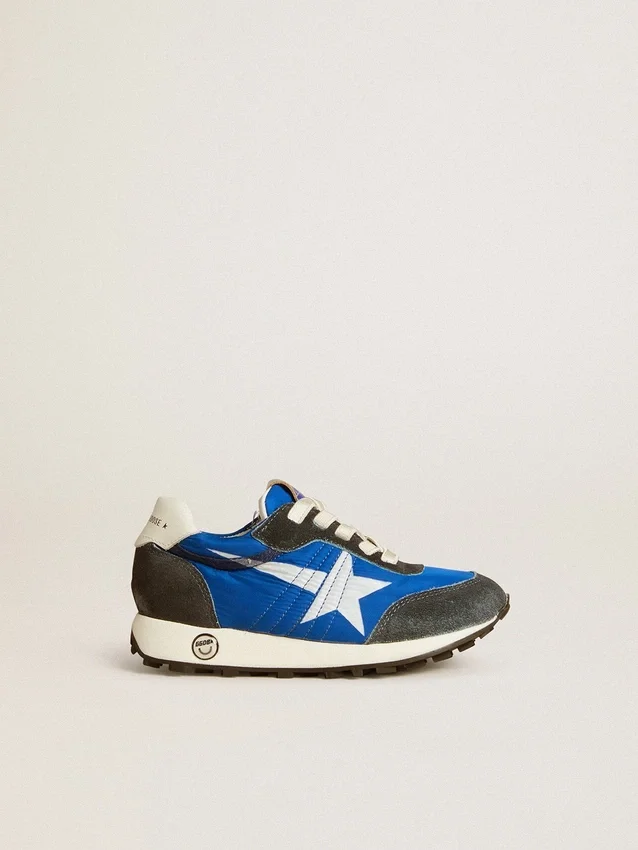 Marathon Junior en nylon azul con estrella estampada y lengüeta de cuero en el talón