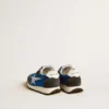 Marathon Junior en nylon azul con estrella estampada y lengüeta de cuero en el talón