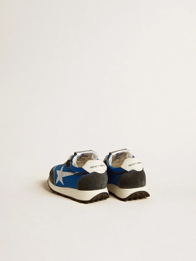 Marathon Junior en nylon azul con estrella estampada y lengüeta de cuero en el talón