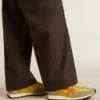 Marathon para hombre con parte superior de nylon amarillo y estrella naranja
