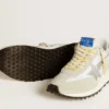 Marathon para hombre con parte superior de nylon blanco y estrella plateada