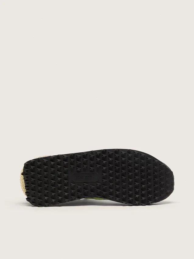 Marathon para hombre con parte superior de nylon verde y estrella negra