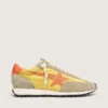 Marathon para hombre con parte superior de nylon amarillo y estrella naranja