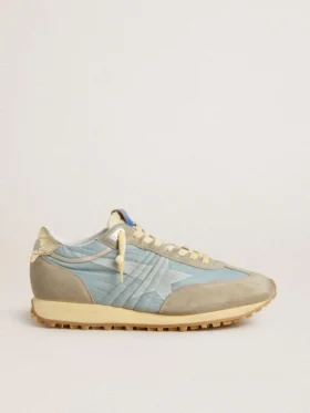 Marathon para mujer con parte superior de nylon azul claro y estrella azul pastel