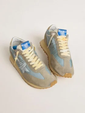 Marathon para mujer con parte superior de nylon azul claro y estrella azul pastel