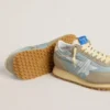 Marathon para mujer con parte superior de nylon azul claro y estrella azul pastel