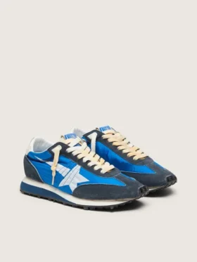 Marathon para mujer con parte superior de nylon azul y estrella blanca