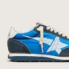 Marathon para mujer con parte superior de nylon azul y estrella blanca