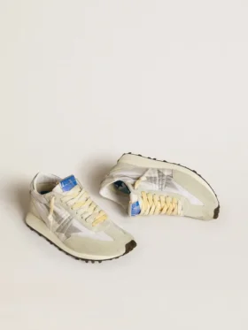 Marathon para mujer con parte superior de nylon blanco y estrella plateada