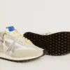 Marathon para mujer con parte superior de nylon blanco y estrella plateada