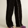 Marathon para mujer con parte superior de nylon morado y estrella blanca