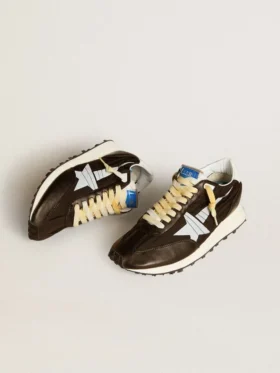 Marathon para mujer con parte superior de nylon negro y estrella blanca