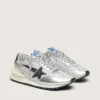 Marathon para mujer con parte superior de nylon ripstop plateado y estrella negra