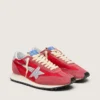 Marathon para hombre con parte superior de nylon rojo y estrella plateada