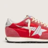 Marathon para hombre con parte superior de nylon rojo y estrella plateada