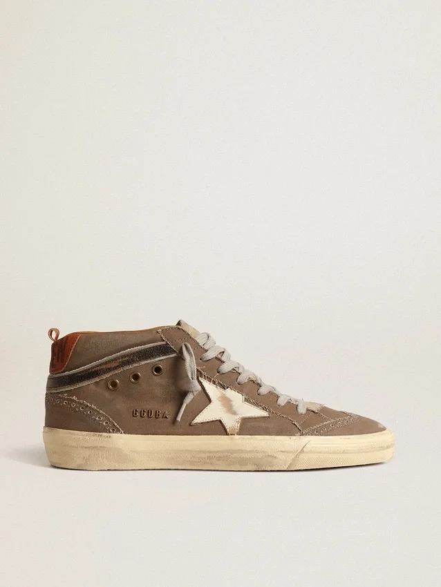 Mid Star en lona verde con estrella de cuero y detalle negro