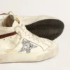 Mid Star LTD en piel napa blanca con estrella plateada con purpurina