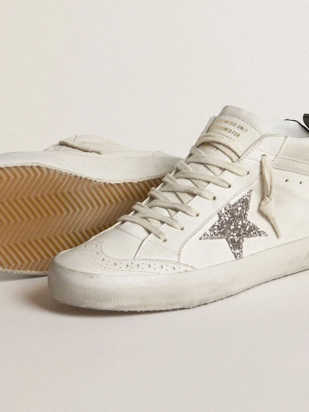 Mid Star para mujer con estrella plateada con purpurina y lengüeta del talón laminada en negro