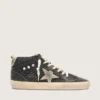 Mid Star para mujer en negro brillante con estrella y lengüeta del talón de gamuza gris paloma