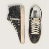 Mid Star para mujer en negro brillante con estrella y lengüeta del talón de gamuza gris paloma