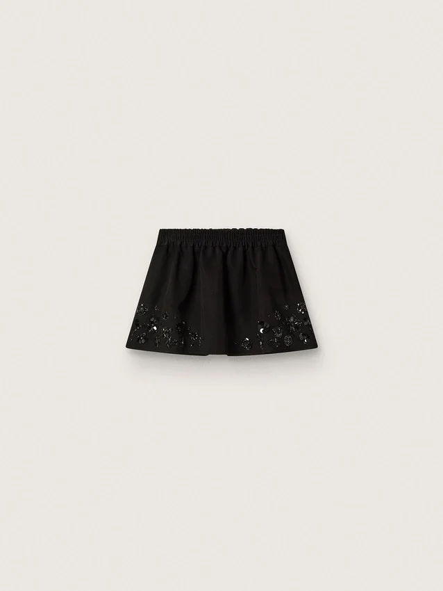 Minifalda para mujer en sarga de algodón negra con bordado floral de lentejuelas