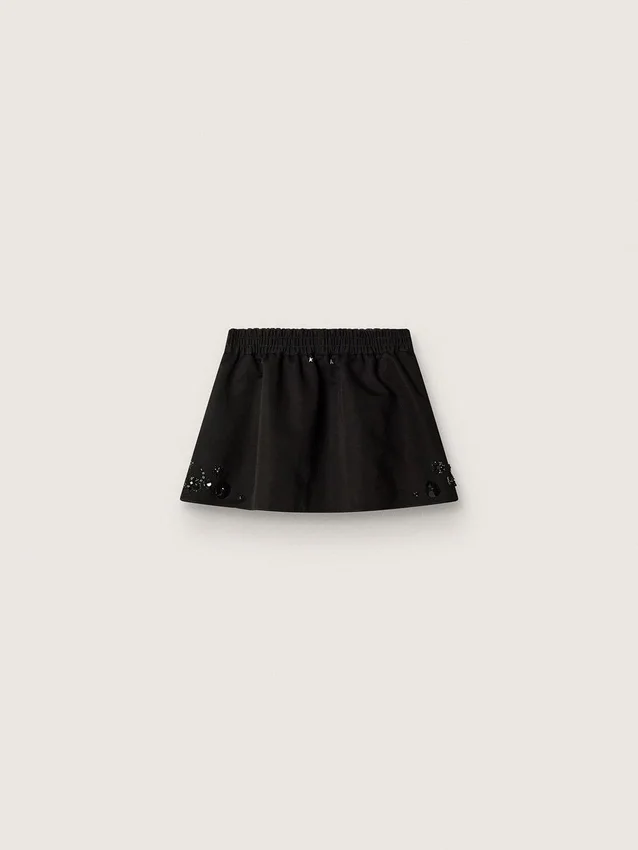 Minifalda para mujer en sarga de algodón negra con bordado floral de lentejuelas