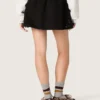 Minifalda para mujer en sarga de algodón negra con bordado floral de lentejuelas