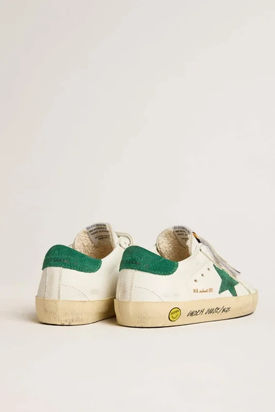 Old School para adolescentes con estrella de gamuza verde y lengüeta en el talón