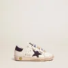 Old School Junior en cuero blanco con estrella de gamuza azul y lengüeta en el talón