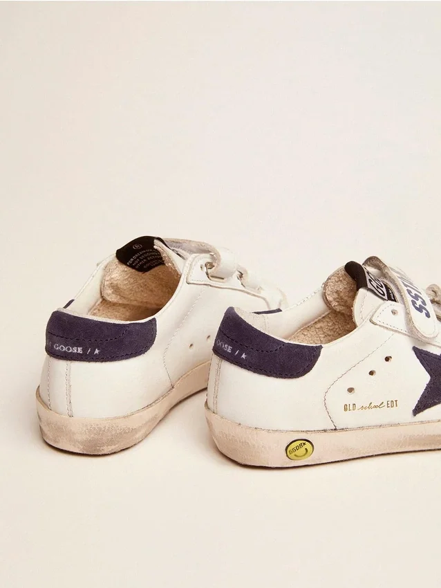 Old School Junior en cuero blanco con estrella de gamuza azul y lengüeta en el talón