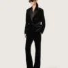 Pantalones acampanados de corte ajustado para mujer en terciopelo de algodón negro