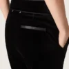 Pantalones acampanados de corte ajustado para mujer en terciopelo de algodón negro