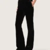 Pantalones acampanados de corte ajustado para mujer en terciopelo de algodón negro
