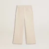 Pantalones anchos de niñas en color crema con costuras acanaladas y bordados