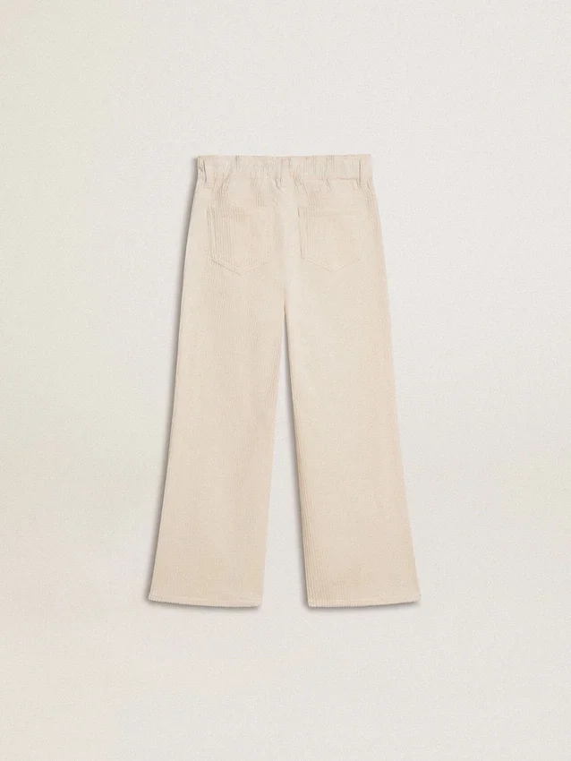 Pantalones anchos de niñas en color crema con costuras acanaladas y bordados