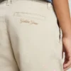 Pantalones chinos beige para niños con toques multicolores