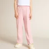Pantalones de chándal rosas con una estrella brillante en la parte delantera