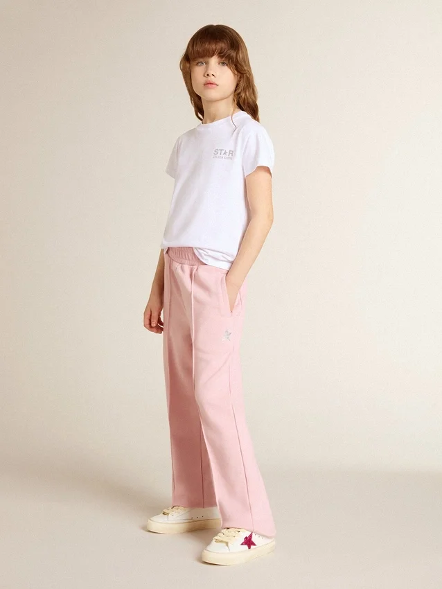 Pantalones de chándal rosas con una estrella brillante en la parte delantera
