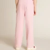 Pantalones de chándal rosas con una estrella brillante en la parte delantera