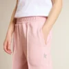 Pantalones de chándal rosas con una estrella brillante en la parte delantera