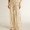 Pantalones de encaje transparente color crema para mujer
