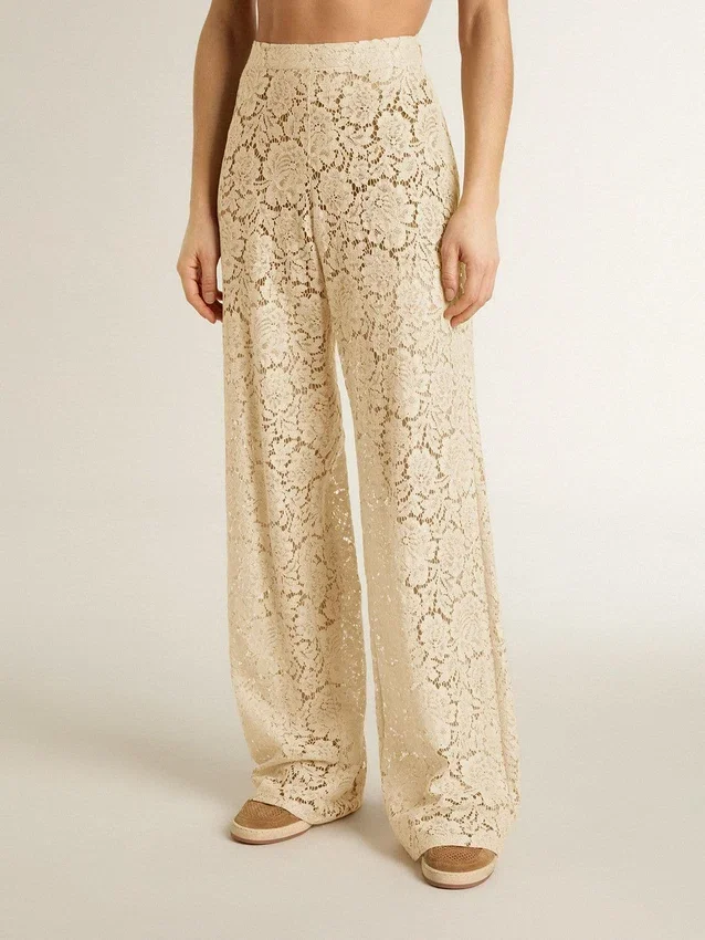 Pantalones de encaje transparente color crema para mujer