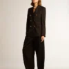 Pantalones de gabardina de lana negros para mujer