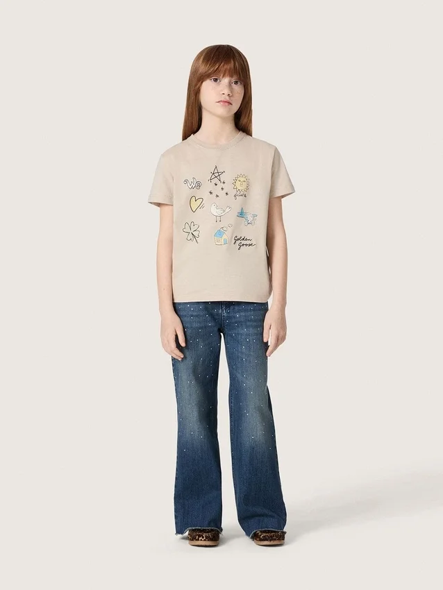 Pantalones de mezclilla de corte acampanado para niñas de la colección Journey en mezclilla azul con pedrería degradada