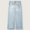 Pantalones de mezclilla de corte acampanado para niñas Golden en denim azul claro con un logotipo bordado