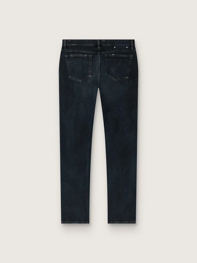 Pantalones de mezclilla de corte ajustado para hombre en mezclilla elástica de color índigo oscuro