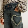 Pantalones de mezclilla de pierna ancha para niñas en azul